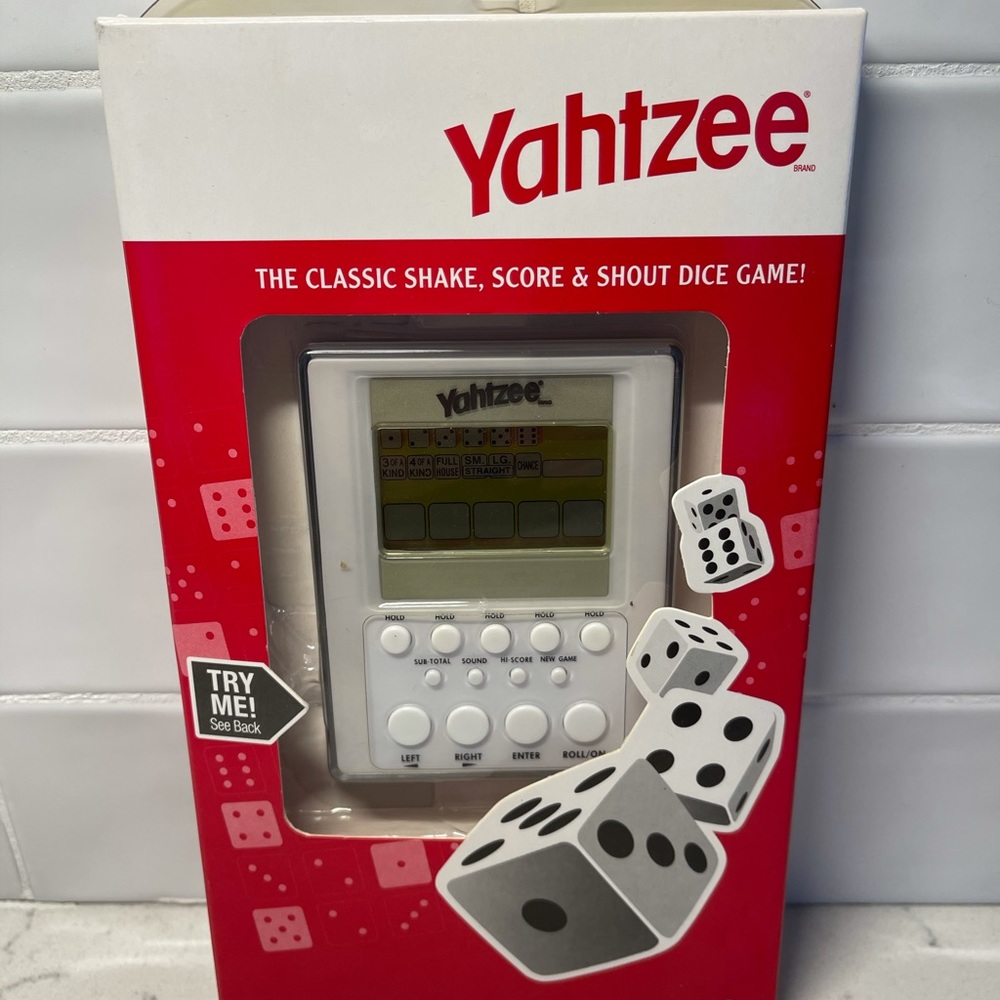 Sealed New Yahtzee Electronic Handheld Dice Game